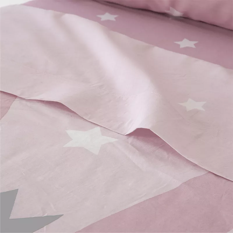detalle del juego de cama infantil rosa algodón poliéster con estrellas