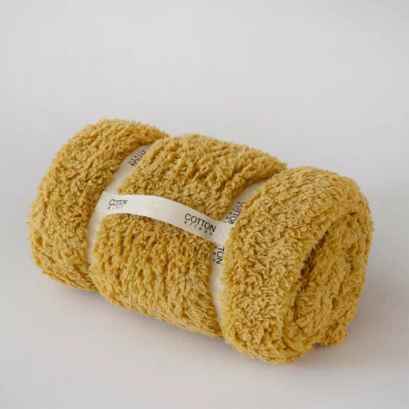 manta de viaje cama sofá color mostaza muy agradable y cálido